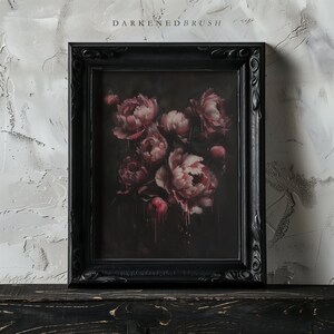 May include: A framed painting of a bouquet of pink peonies with dark red accents, set against a dark background. The frame is black with ornate detailing.