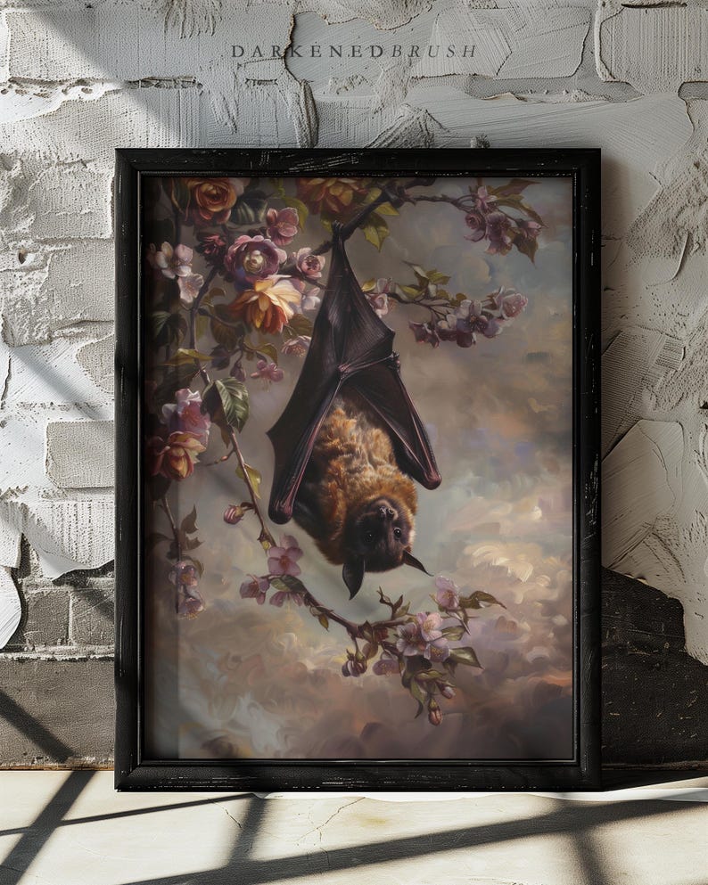 May include: A framed painting depicting a brown bat hanging upside down from a branch of a flowering tree. The bat is surrounded by pink and white blossoms. The background is a soft, hazy blue.