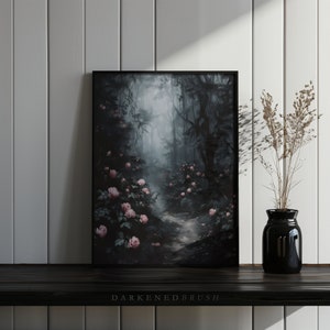 May include: A framed painting of a dark, misty forest path lined with pink roses. The path leads into the distance, disappearing into the fog. The painting has a dark and moody atmosphere.