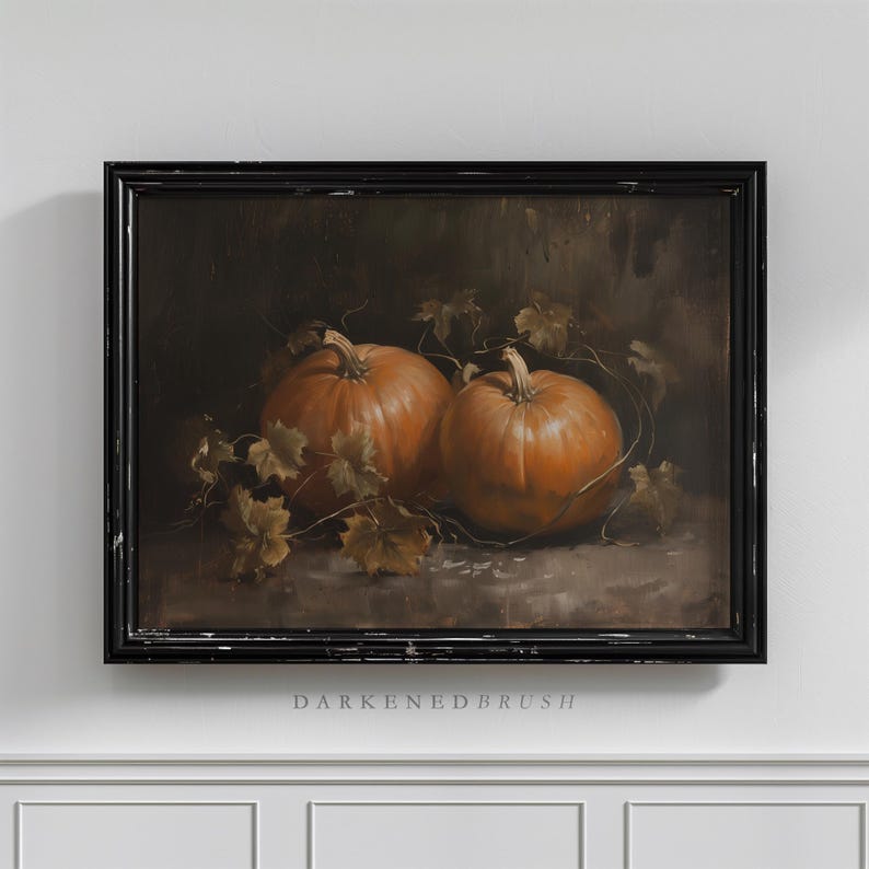 May include: A framed painting of two orange pumpkins with brown vines and leaves on a dark brown background.
