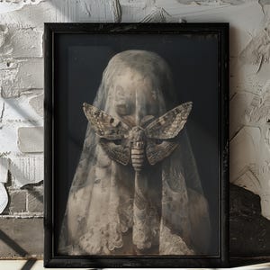 May include: A black framed portrait of a person wearing a white veil with a large moth covering their face. The moth is brown and black with intricate patterns.