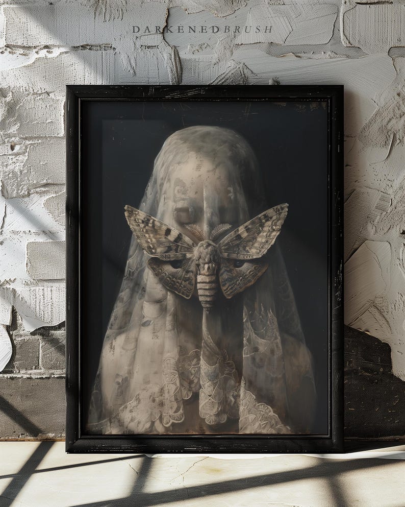 May include: A black framed portrait of a person wearing a white veil with a large moth covering their face. The moth is brown and black with intricate patterns.