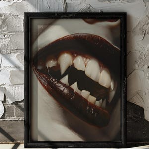 May include: Close-up of a mouth with dark red lipstick and sharp, white teeth. The teeth are pointed and fang-like, giving the image a sinister and eerie feel.