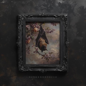 May include: A framed painting depicting a brown bat hanging upside down from a branch of a flowering tree. The bat is a dark brown and black colour, and the flowers are pink and white. The painting is set against a cloudy sky background.