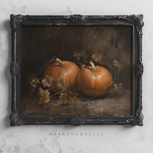 May include: A painting of two orange pumpkins with green leaves in a dark brown frame. The painting is titled "Darkened Brush".