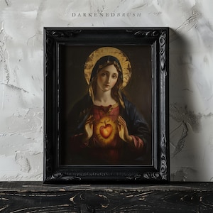 May include: A framed painting depicting a woman with a halo, holding a heart in her hands. She is wearing a blue robe and a red dress. The heart is glowing and has a crown of thorns.