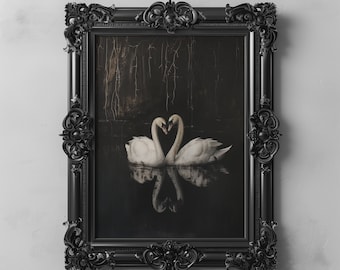 May include: A black ornate frame with a dark background image of two white swans with their necks intertwined in a heart shape, reflecting in the water.