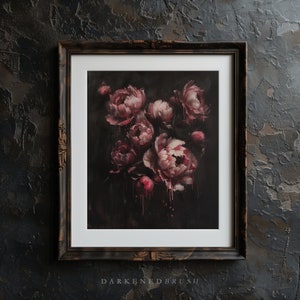 May include: A framed painting of a bouquet of pink peonies with dark red dripping paint on a black background. The frame is dark brown wood with gold accents.