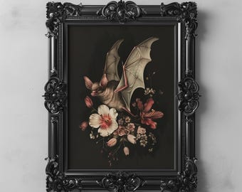 Puede incluir: Una impresión enmarcada de un murciélago con las alas extendidas posado sobre un grupo de flores rosas y blancas sobre un fondo oscuro. El marco es negro con detalles ornamentados.