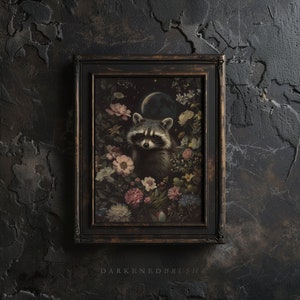May include: A framed illustration of a raccoon surrounded by flowers and a crescent moon. The raccoon has black eyes and a black nose. The flowers are pink, white, and blue. The background is dark.