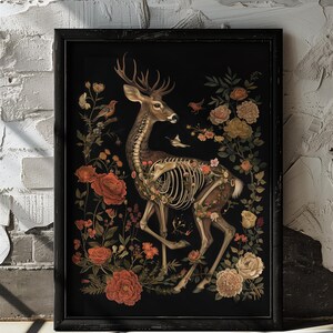 May include: A skeletal deer with antlers is surrounded by a vibrant floral arrangement. The deer is depicted in a standing pose, with its legs and ribs visible. The flowers are a mix of red, white, and yellow, and they are arranged in a circular pattern around the deer. The background is black.