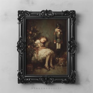 May include: A framed painting with a black ornate frame. The artwork depicts a young person asleep near a Christmas tree and a toy soldier. The painting has a vintage aesthetic with soft colors and a dreamlike quality.