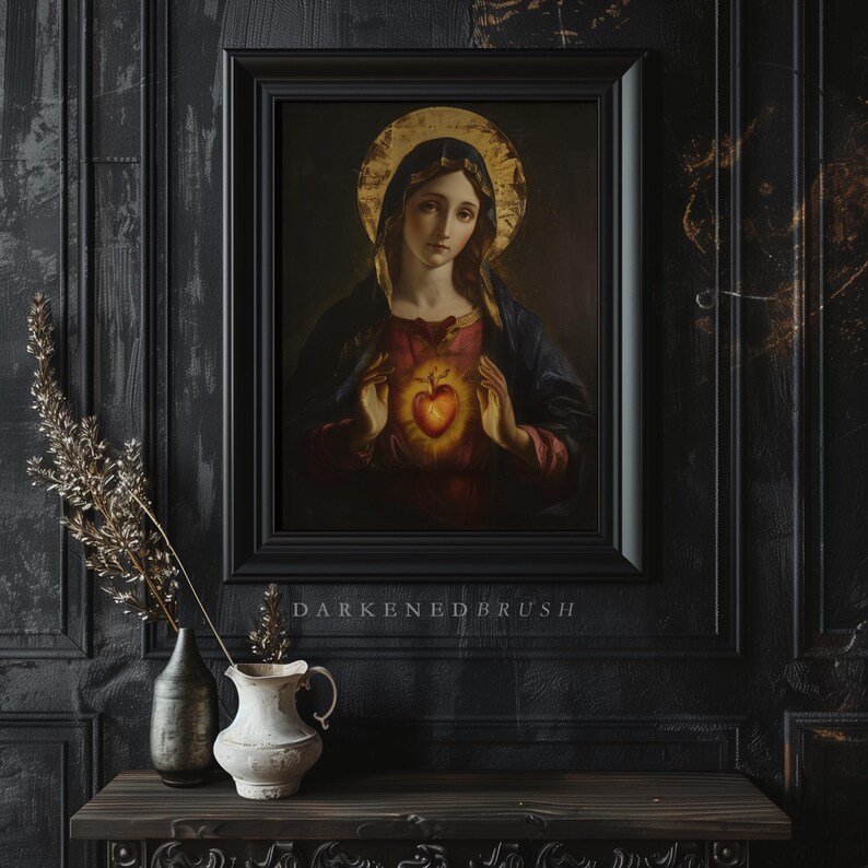 May include: A framed painting of a woman with a halo holding a heart in her hands. The woman is wearing a blue robe and the heart is glowing red. The painting is set against a dark background with the text "DARKENED BRUSH" below the frame.
