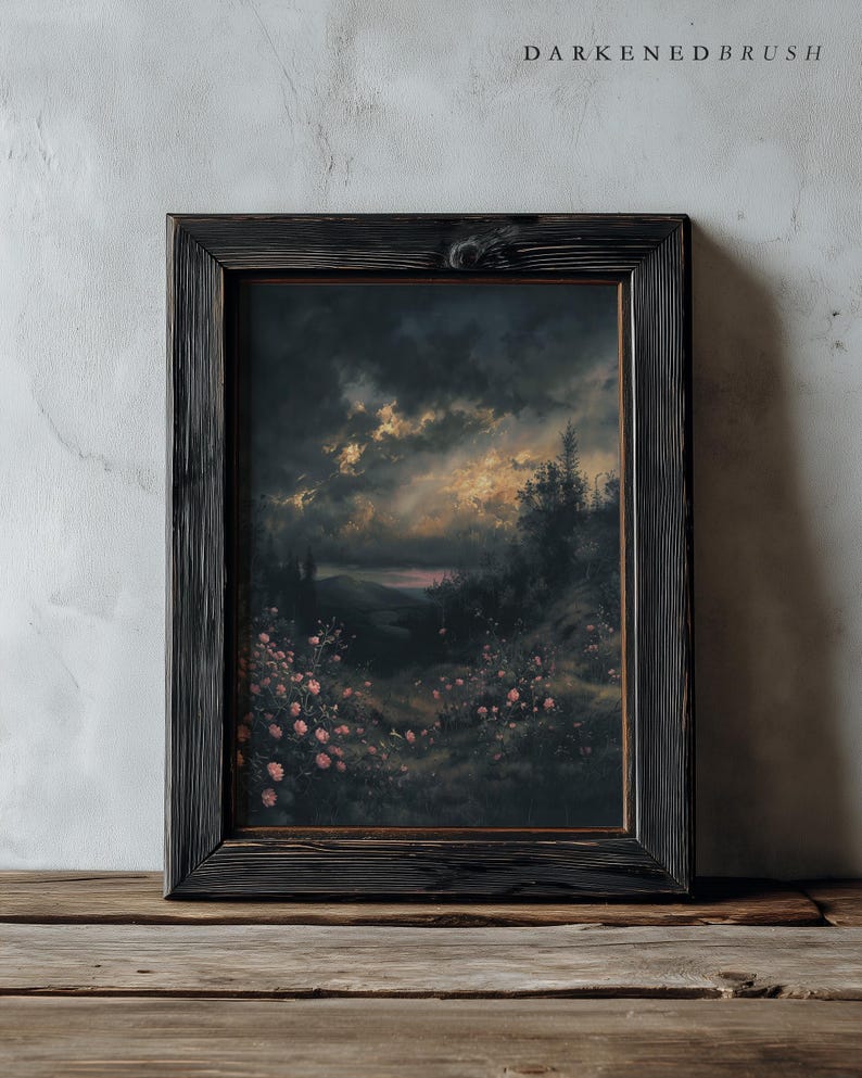 May include: A framed landscape painting with a dark, stormy sky and a field of pink flowers. The painting is in a black wooden frame. The text "DARKENEBRUSH" is at the top.