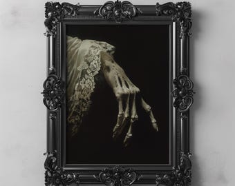May include: A black ornate frame with a dark background and a skeletal hand reaching out from a white lace sleeve.