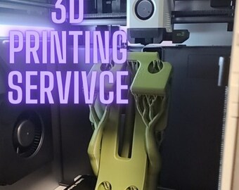 May include: A 3D printer is printing a green plastic object. The object has a tree-like design. The text "3D PRINTING SERVICE" is visible in the image.