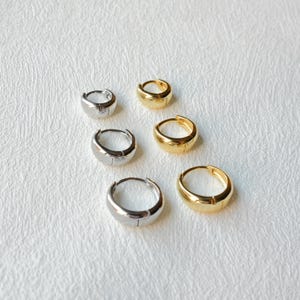 For those who adore gold, this pair is perfect to elevate your daily ensemble. Comfortable and timelessly chic, they effortlessly complement any outfit. Crafted with the finest materials, we hope our jewelry becomes a cherished part of your journey.