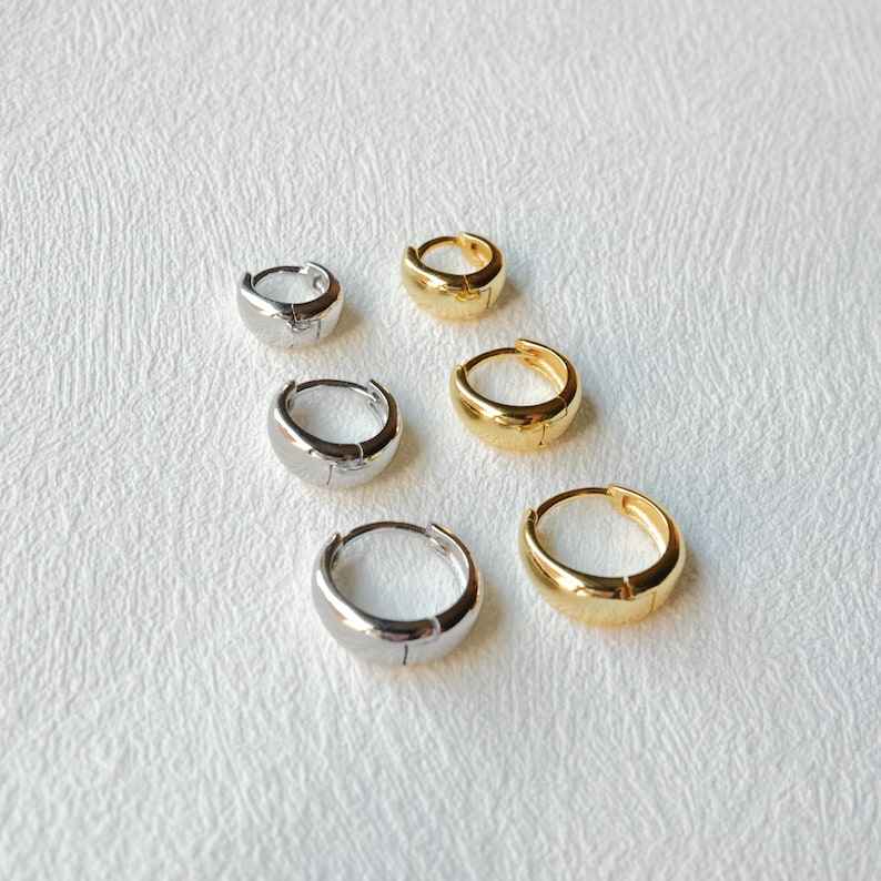 For those who adore gold, this pair is perfect to elevate your daily ensemble. Comfortable and timelessly chic, they effortlessly complement any outfit. Crafted with the finest materials, we hope our jewelry becomes a cherished part of your journey.