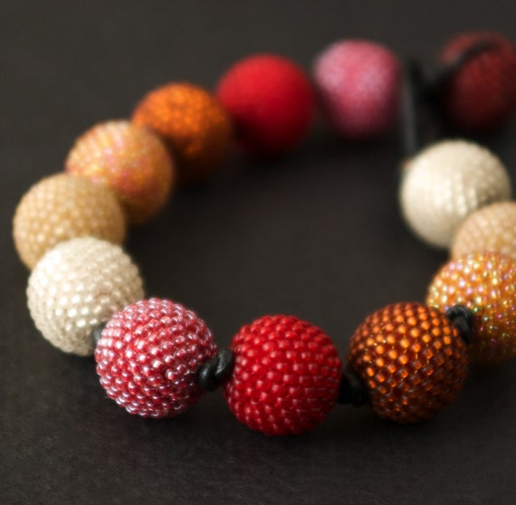 Items similar to Knotted Dots Bracelet Cherry Colored Twist on Etsy