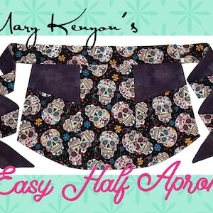 May include: A black half apron with a colorful sugar skull print and purple ties. The apron has two large pockets on the front. The text "Mary Kenyon's Easy Half Apron" is written below the apron.