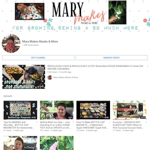 May include: A screenshot of a YouTube channel page for "Mary Makes Masks & More". The channel features videos on sewing, gardening, and crafting. The banner image features the channel name in a colorful font with a floral design. The channel has 1.68K subscribers. The featured video is titled "RIDICULOUSLY EASY & RIDICULOUSLY CUTE!!! Reversible DOGGIE BANDANNA!!! A Great Gift ANYONE CAN MAKE!" and has 6.6K views.