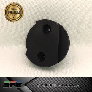 May include: Black plastic wheel holder with three holes. SIMUCUBE wheel holder text is visible at the bottom of the image.