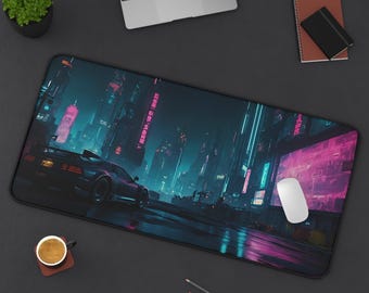 May include: A black and blue gaming mouse pad with a futuristic city scene and a car driving through the streets. The city is lit up with neon lights and the car has a pink glow. The mouse pad is on a black surface.