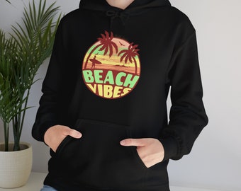 May include: Black hoodie with a retro-style graphic of palm trees, a surfer, and a sunset. The graphic has the text "Beach Vibes" in a circle.