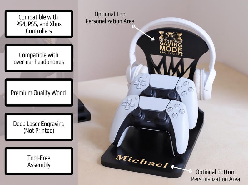 May include: Black wooden gaming controller and headphone stand with white controllers and headphones. The stand has the text "DO NOT DISTURB GAMING MODE ACTIVATED" and the name "Michael". It is compatible with PS4, PS5, and Xbox controllers.