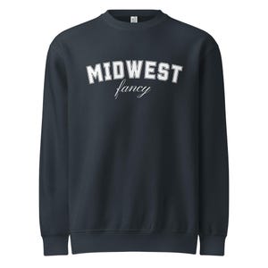 May include: Navy blue sweatshirt with the words "MIDWEST" in bold, white, block letters above the word "fancy" in a white script font. The sweatshirt is a crew neck style.