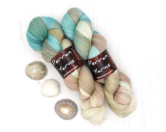 Sparkly laceweight merino silk yarn handdyed in shade Sandy Toes
