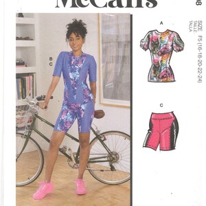 Mccall&#39;s 8208 Size 16, 18, 20, 22, 24 Plus size pattern: Biking shorts and short sleeve workout top with princess seams.  Color block