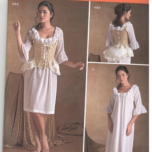 May include: A sewing pattern for a white dress with a ruffled neckline and a white corset with a lace-up front. The pattern is from Simplicity and is for sizes 6-14, 32-40, and 34-42.