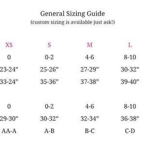 May include: A general sizing guide for clothing with measurements in inches for waist, hip, chest, and cup sizes. The sizes are listed as XS, S, M, L, and XL. The guide includes numerical sizes, such as 0, 0-2, 4-6, 8-10, and 12-14.