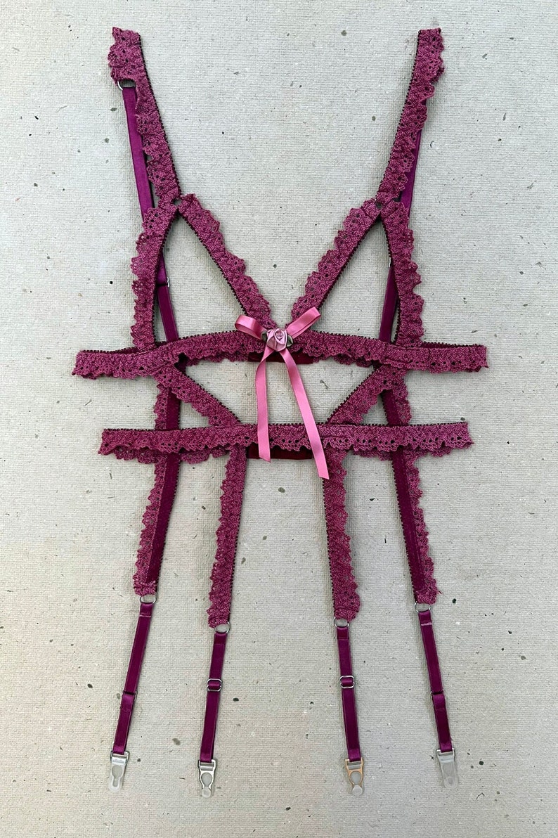 This style is made from hand dyed vintage crochet lace. This listing is for the body cage only.


This made to order style features:

- elasticated lace straps

- vintage rosette bow detail

- adjustable bra and garter straps

- hook and eye closures