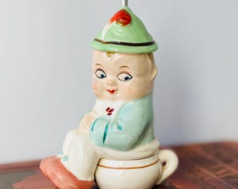 Figura rara y escasa de un niño alemán en el orinal, dispensador de mostaza de cerámica Senfspende
