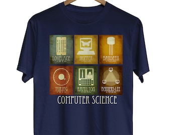May include: A navy blue t-shirt with a vintage-style graphic featuring six icons representing key figures in computer science. The icons include Ada Lovelace, Grace Hopper, John Bardeen, Alan Turing,  Robert Hamilton, and Tim Berners-Lee. The text "COMPUTER SCIENCE" is printed below the icons.