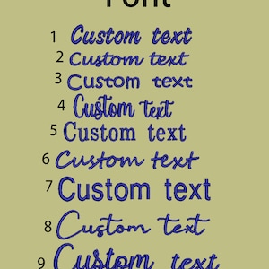 May include: A display of nine different blue custom text fonts, numbered 1 through 9, against a light olive-green background. The word "Font" is at the top in black. Each font style is unique.