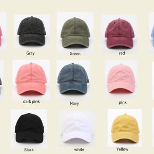 May include: A collection of 15 baseball caps in various colors, including rose red, gray, green, red, light blue, brown, dark pink, navy, pink, purple, cream, black, white, yellow, and khaki.