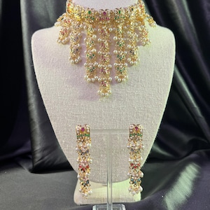 Authentic Jadau choker set with earrings. Hyderabadi Jadau jewelry/ Punjabi Jadau jewelry. Nizam choker set with earrings.