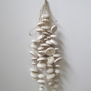 Serene ceramic wind chime organic hanging bells garden sculpture Mudpuppy Moon Chimes in unglazed natural buff Half Set image 2