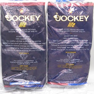 May include: Two packages of Jockey Life briefs made of 100% combed cotton. The dark blue packaging features white text detailing features like a low waistline, two-layer pouch, and Inverted Y-Front fly, with a size chart for waists 30 to 40 inches.