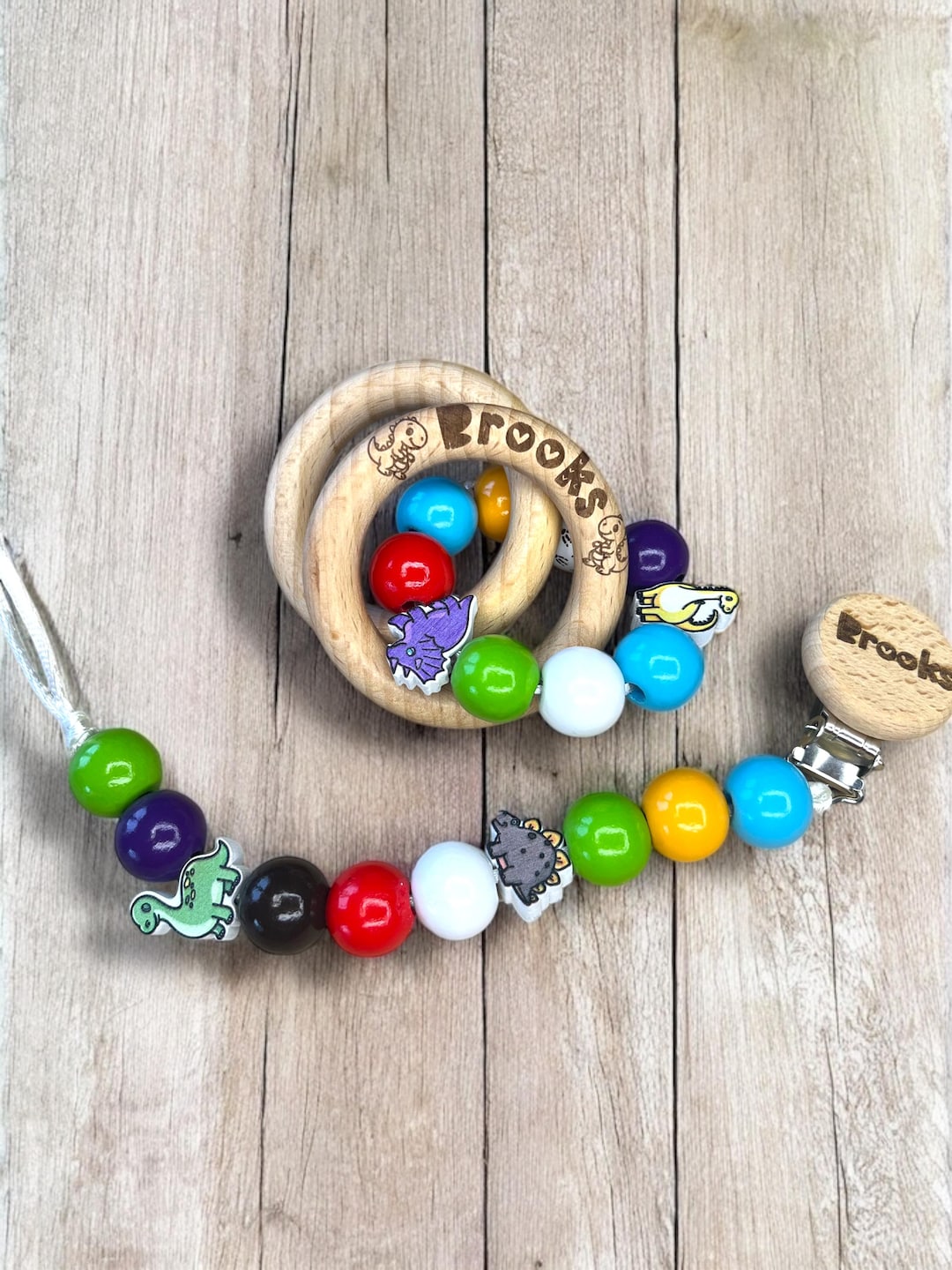 Personalized Beechwood Baby Rattle and Pacifier Clip: Dinosaur Theme ...