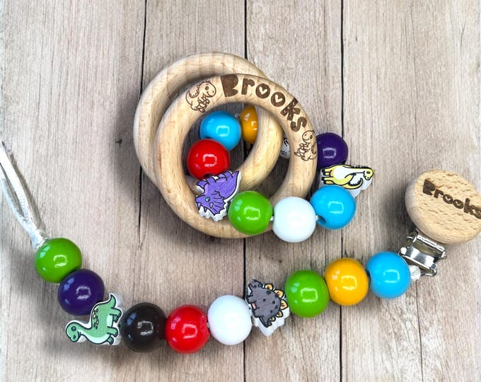 Personalized Beechwood Baby Rattle and Pacifier Clip: Dinosaur Theme wood beads