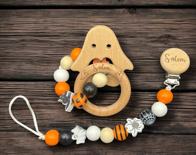 Pacifier clip and rattle in Halloween design
