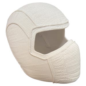 May include: White plastic helmet with a textured surface and a visor. The helmet has a large opening for the face.