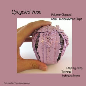 May include: A purple upcycled vase made with polymer clay and semi-precious stone chips. The vase is decorated with a floral design and has a lace-like texture.