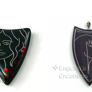 Two examples of polymer clay pendants in Faux Cloisonne techniques with women faces in Art Nouveau style.