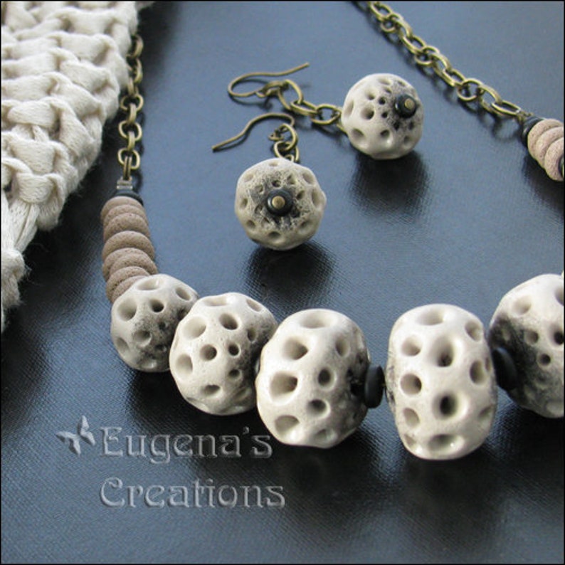 A polymer clay necklace and earrings set made using the technique demonstrated in the Openwork Bracelets tutorial.  This is to show the possibilities of the technique.  How to make this set is not explained in the tutorial.