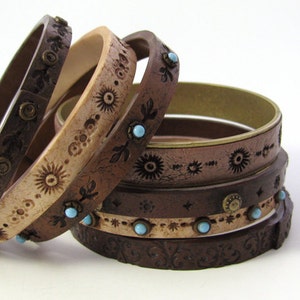 Examples of polymer clay bracelet designs explained in Eugena's Faux Leather Bracelets tutorial.